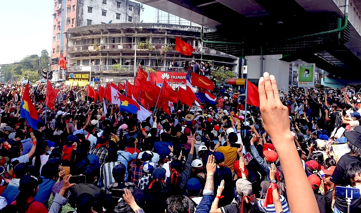Protesters participate in an anti-military rally in downtown Yangon